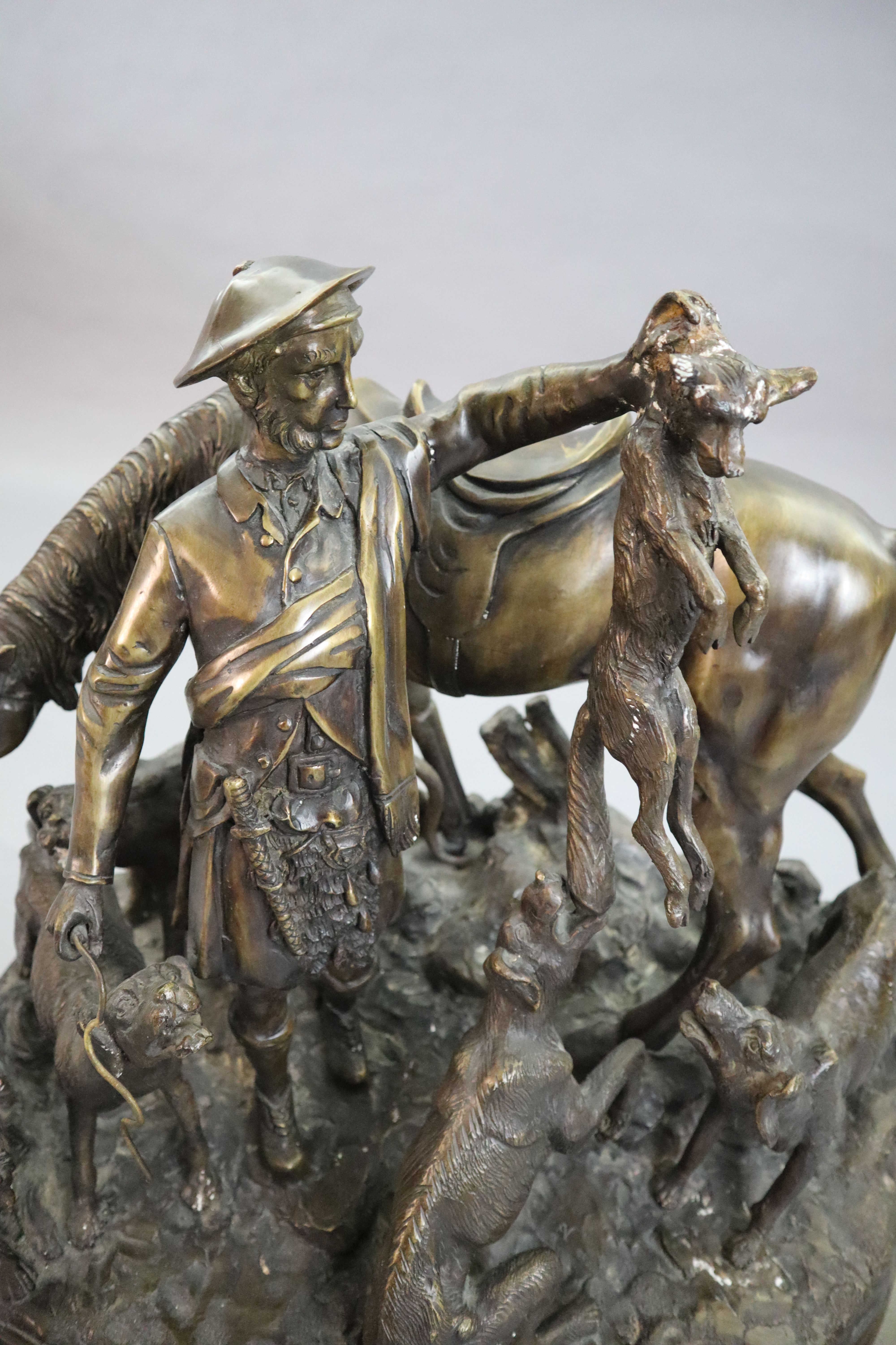 After Pierre Jules Mene. A bronze group of a ghillie, pony and hounds, width 23in. height 20in.